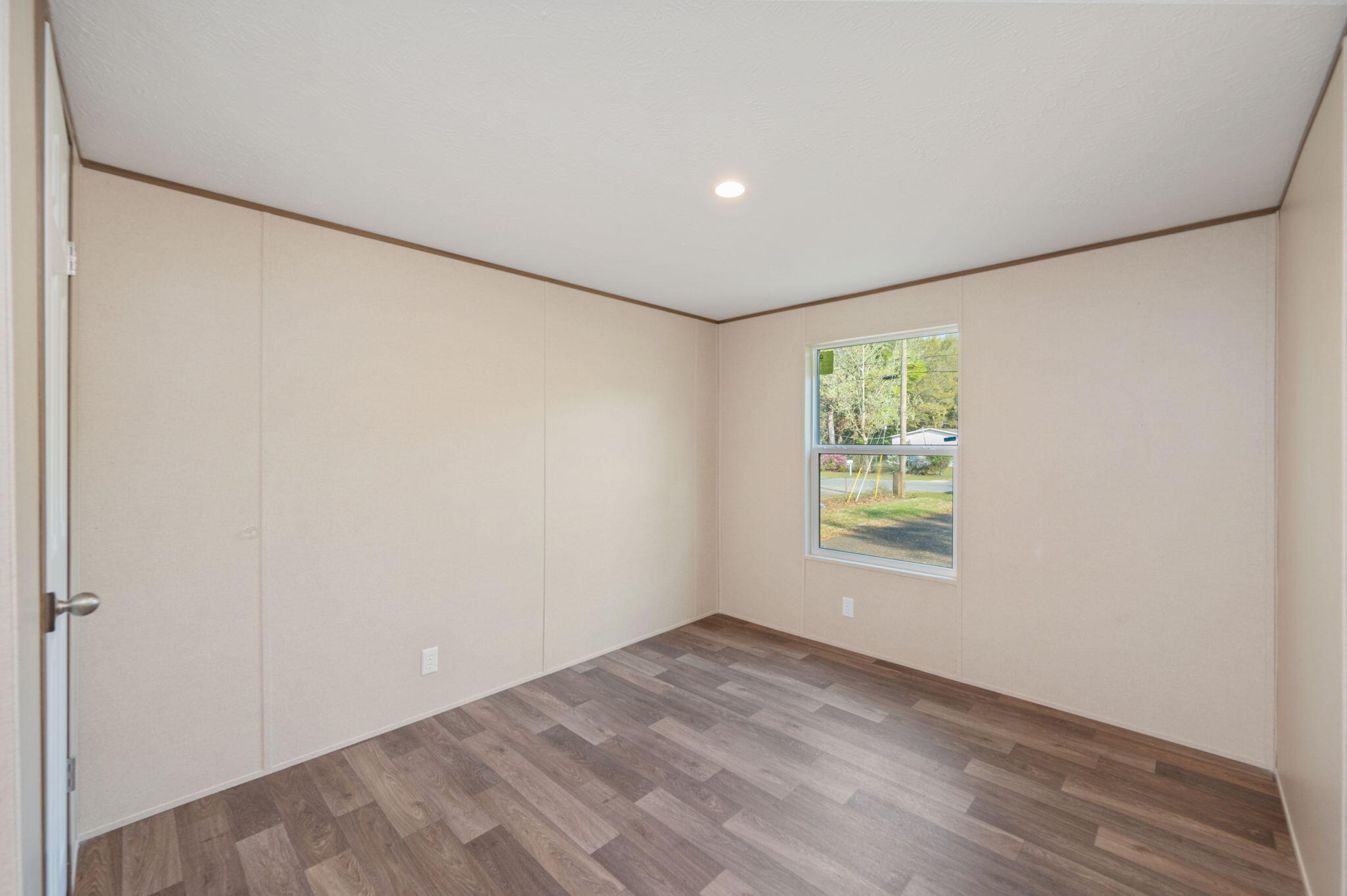 8255 Punjob Road Milton, FL 32583 - Photo 17 of 37 an empty room with windows