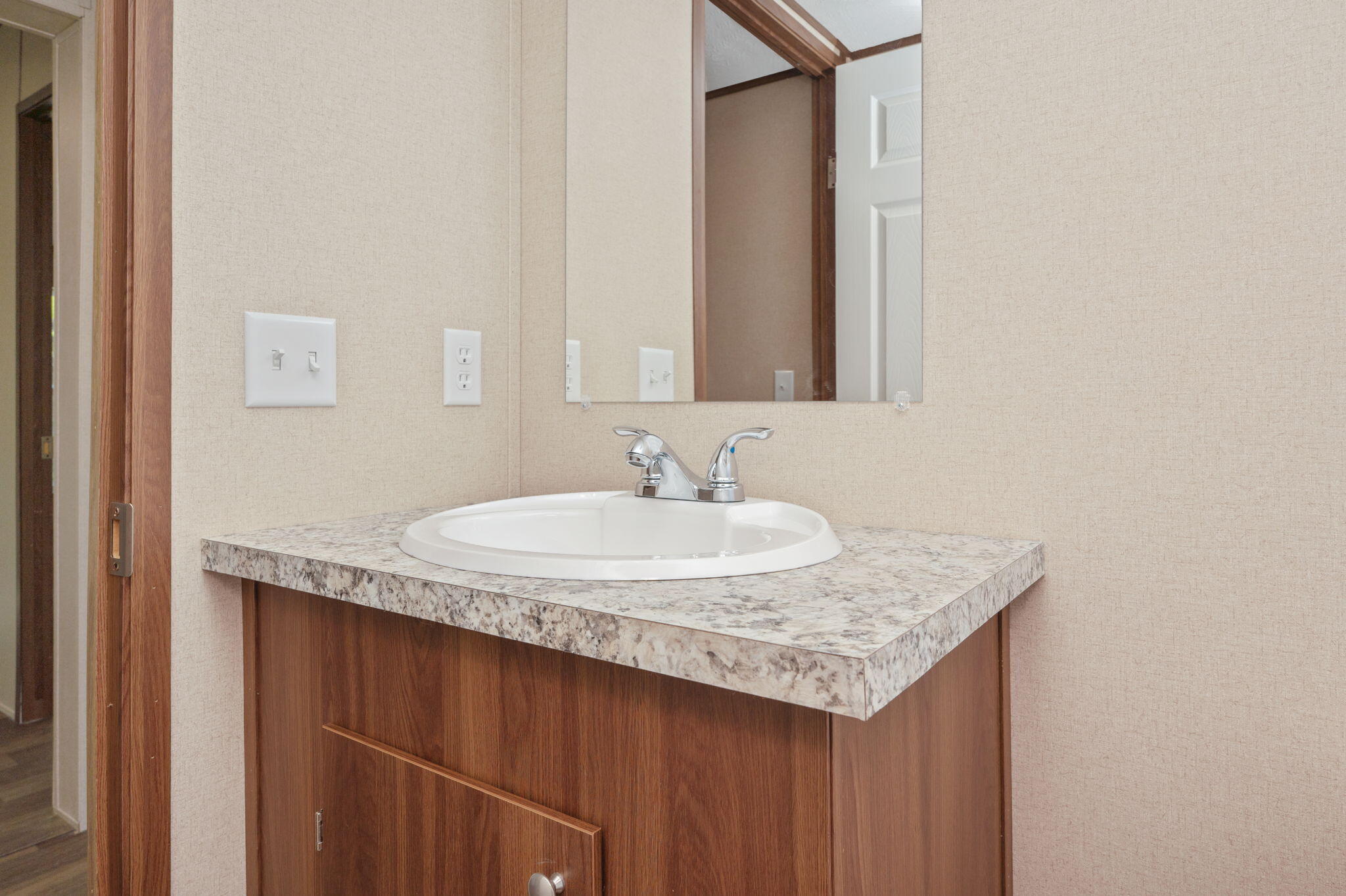8255 Punjob Road Milton, FL 32583 - Photo 21 of 37 a sink and a mirror
