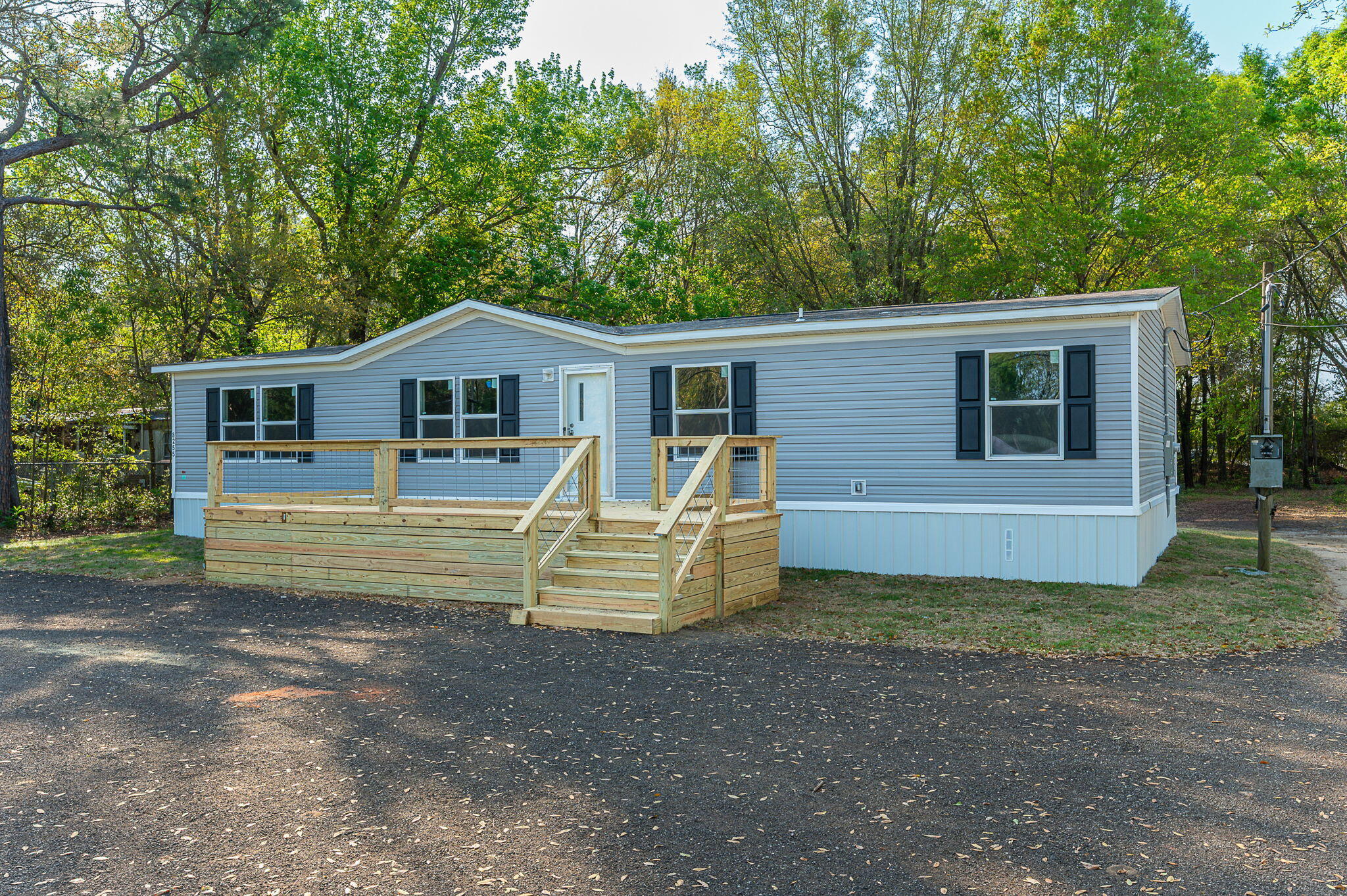 8255 Punjob Road Milton, FL 32583 - Photo 3 of 37 a view of a house with a yard