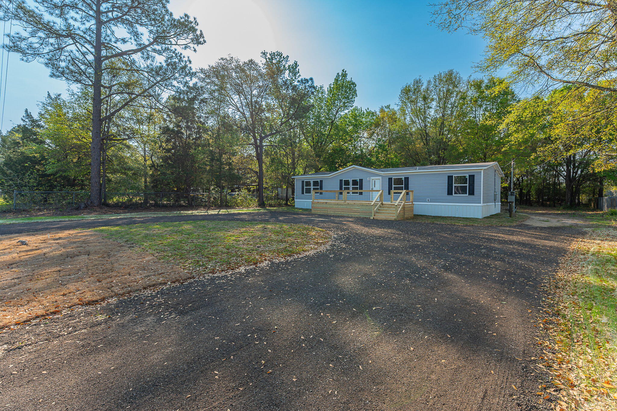 8255 Punjob Road Milton, FL 32583 - Photo 4 of 37 a view of an house with backyard space and balcony