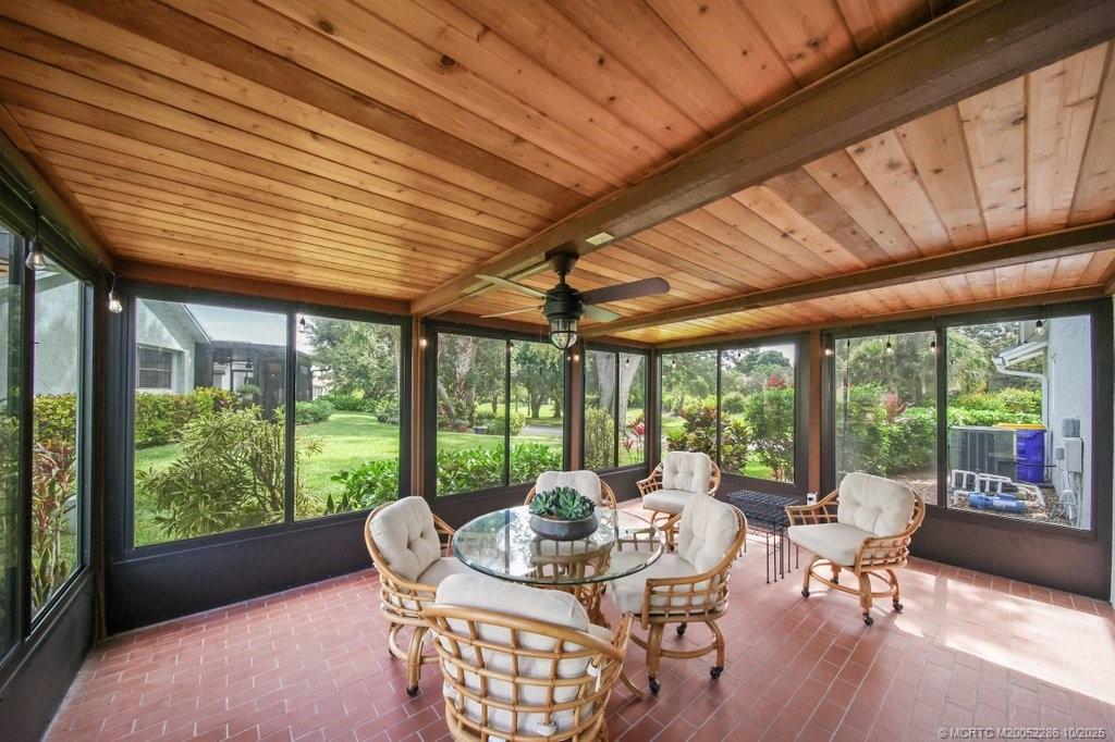 5157 Southeast Miles Grant Road Stuart, FL 34997 - Photo 16 of 32 a dining room with furniture water view and balcony