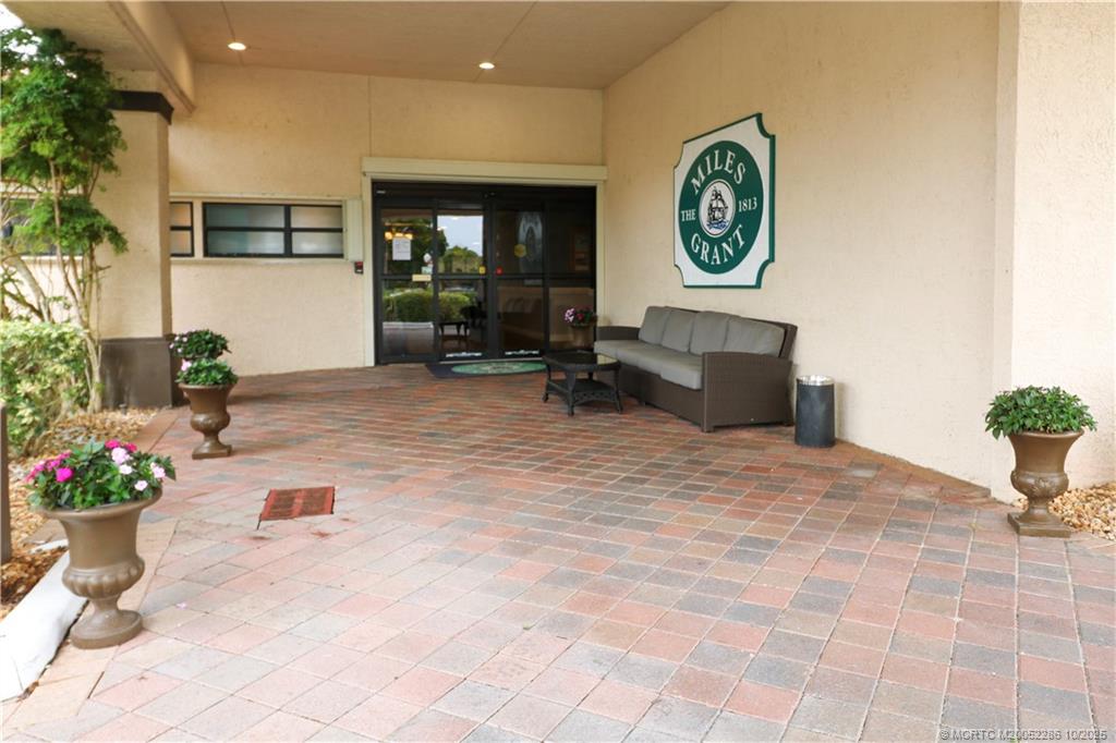 5157 Southeast Miles Grant Road Stuart, FL 34997 - Photo 23 of 32 a view of a entryway of a house