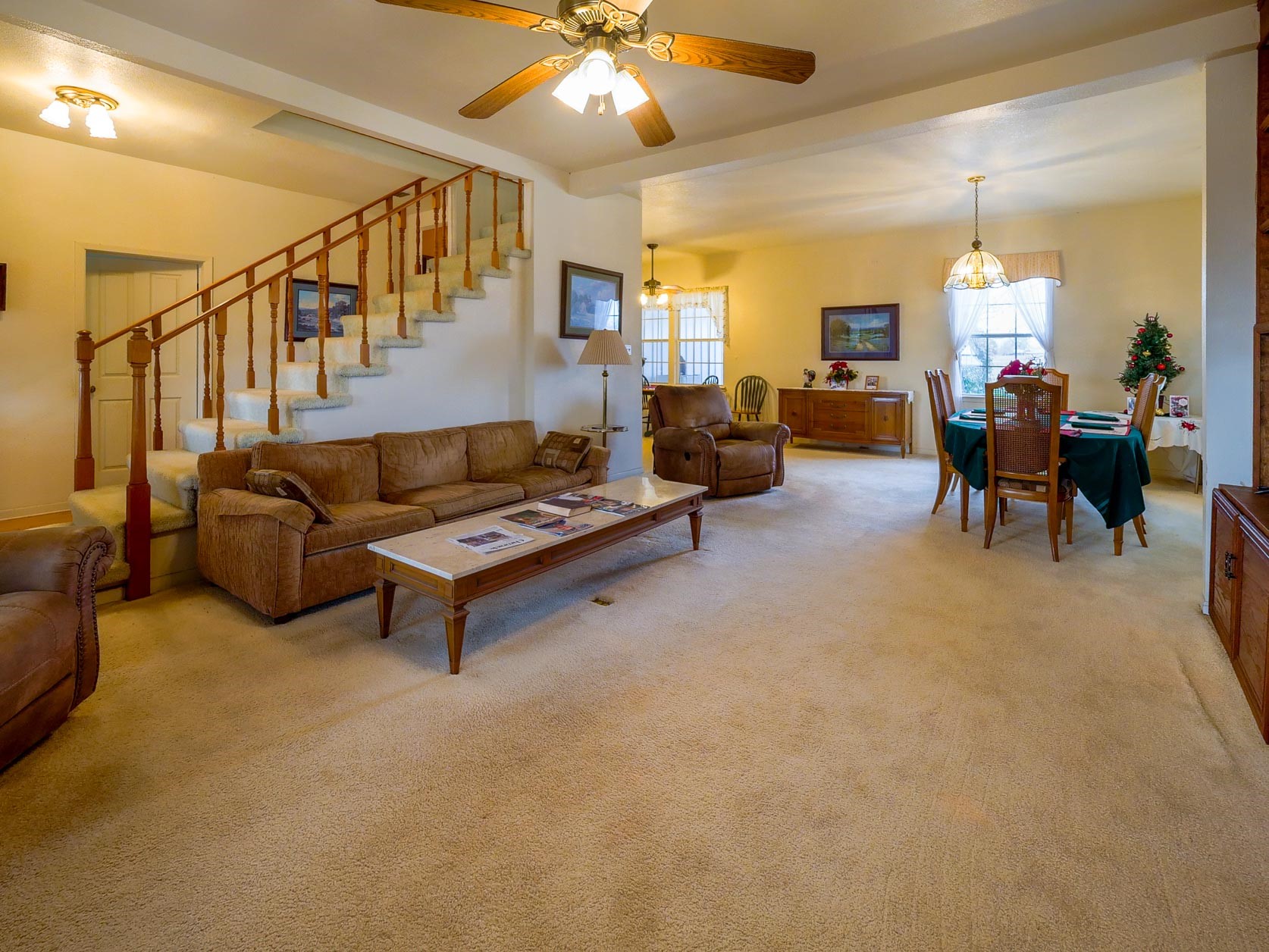 1505 Prairie Valley Road West Point, TX 78963 - Photo 19 of 34 a living room with furniture and a chandelier