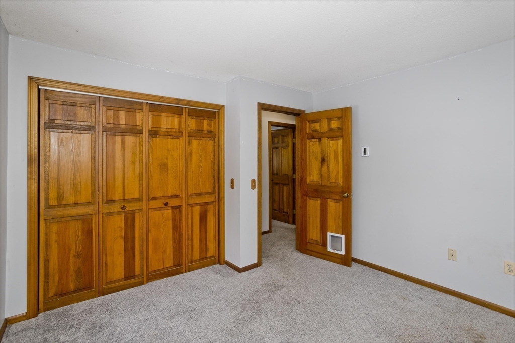26 Falls Road Sunderland, MA 01375 - Photo 17 of 39 an empty room with a door