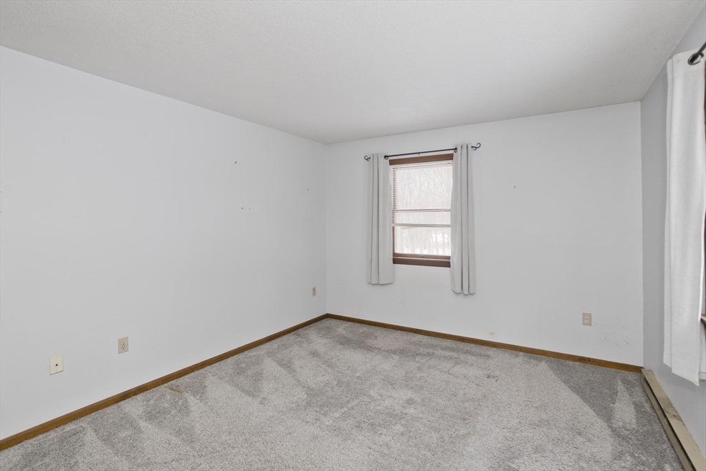 26 Falls Road Sunderland, MA 01375 - Photo 20 of 39 an empty room with a window
