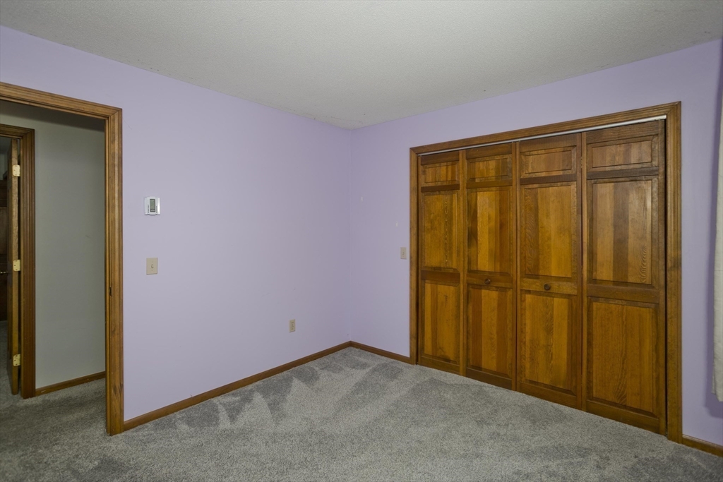 26 Falls Road Sunderland, MA 01375 - Photo 25 of 39 an empty room with a door