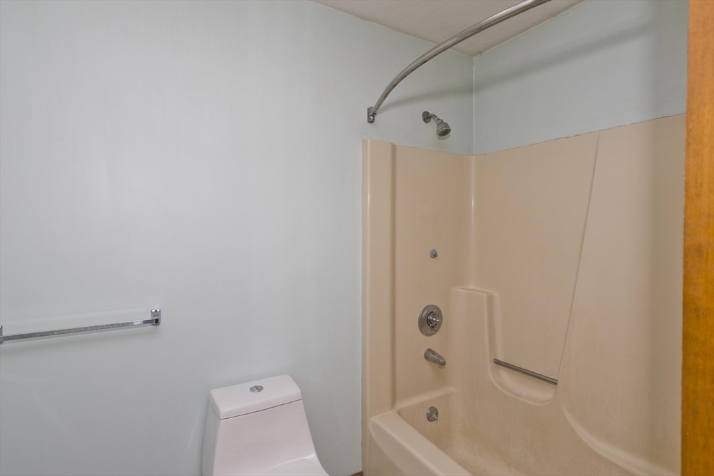 26 Falls Road Sunderland, MA 01375 - Photo 29 of 39 a bathroom with a tub and shower