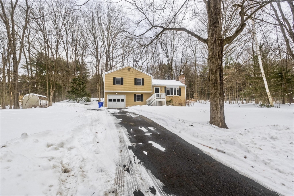 26 Falls Road Sunderland, MA 01375 - Photo 3 of 39 a view of a road with snow on the road
