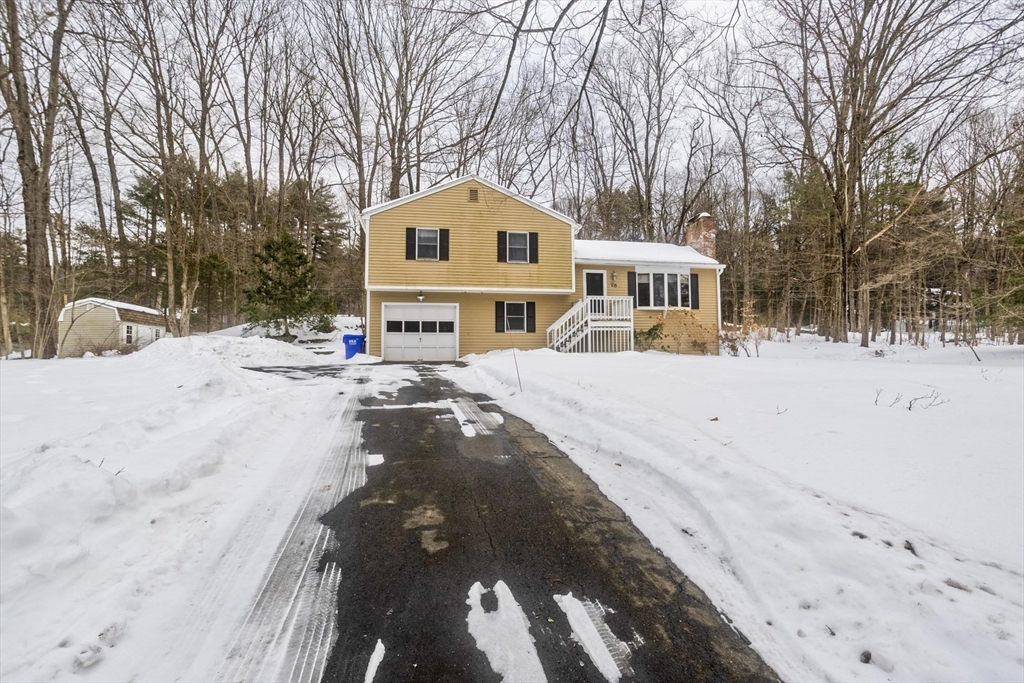 26 Falls Road Sunderland, MA 01375 - Photo 4 of 39 a view of a yard with snow on the roadside