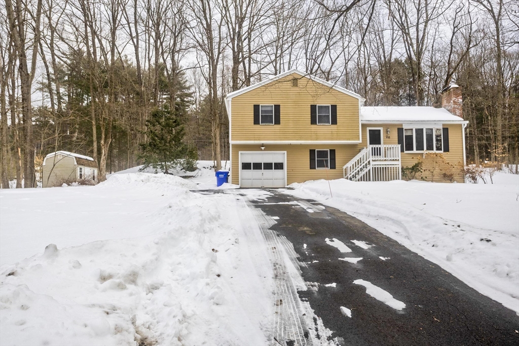 26 Falls Road Sunderland, MA 01375 - Photo 5 of 39 a front view of a house with a yard covered in snow