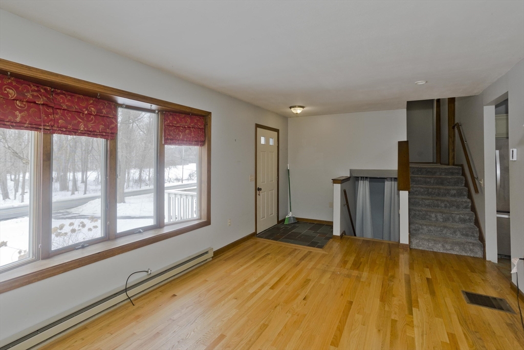 26 Falls Road Sunderland, MA 01375 - Photo 10 of 39 a room with a bed and wooden floor