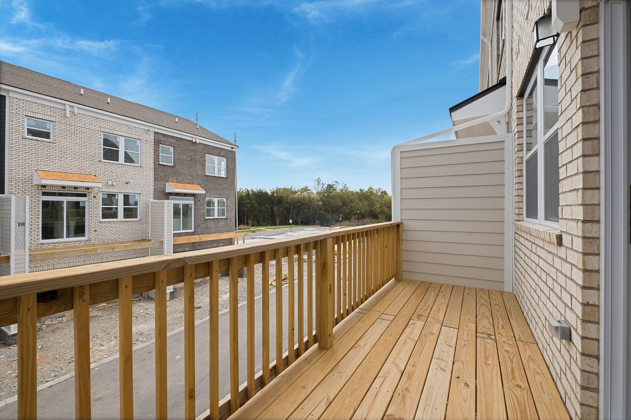 514 Hinton Street Lebanon, TN 37090 - Photo 15 of 58 a view of a balcony with wooden floor and fence
