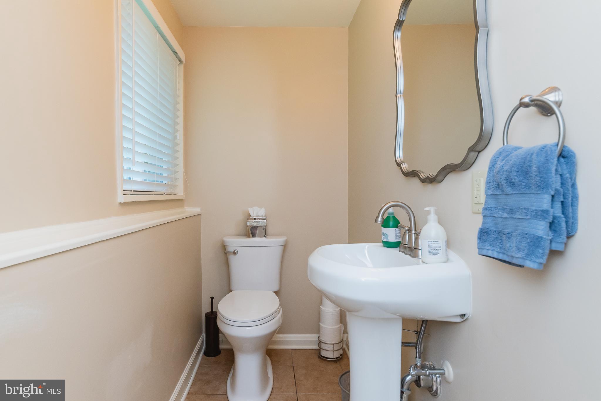 202 Burning Tree Road Lutherville-Timonium, MD 21093 - Photo 19 of 31 Remodeled half bath in lower level