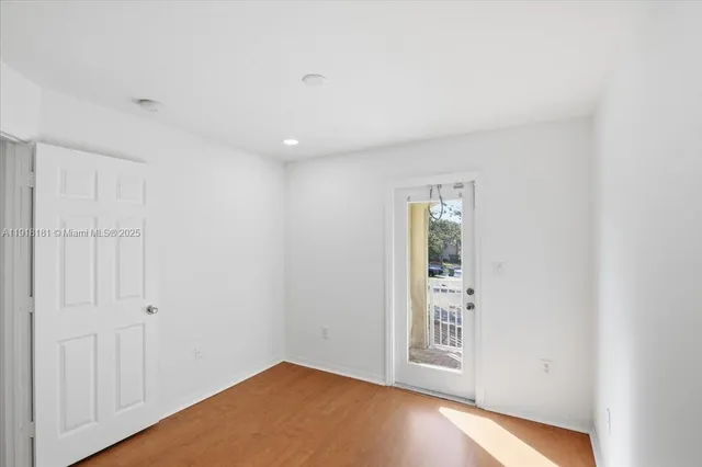 a view of an empty room and window