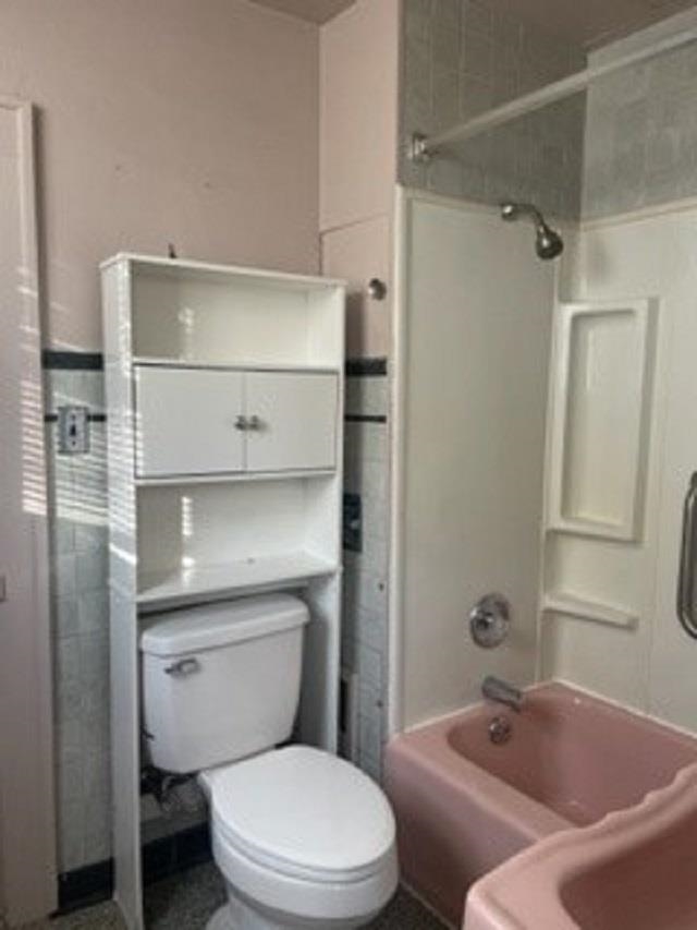 1646 South Topeka Avenue Wichita, KS 67211 - Photo 16 of 36 Bathroom is pink. Original or 1950's updated pink bathtub and sink. It's in great shape!