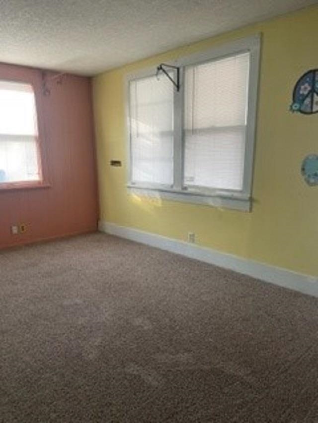 1646 South Topeka Avenue Wichita, KS 67211 - Photo 4 of 36 This is the space to the right, as you walk in the front door, where the bedroom was located.