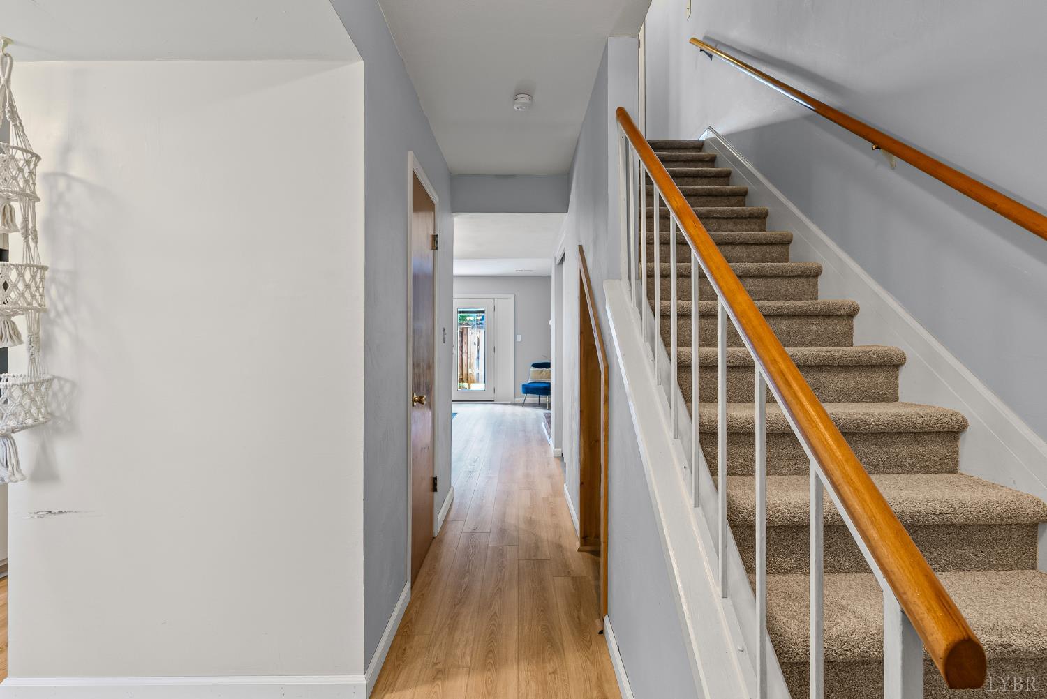 3101 Link Road, Unit 11 Lynchburg, VA 24503 - Photo 21 of 41 a view of a hallway with wooden floor and stairs