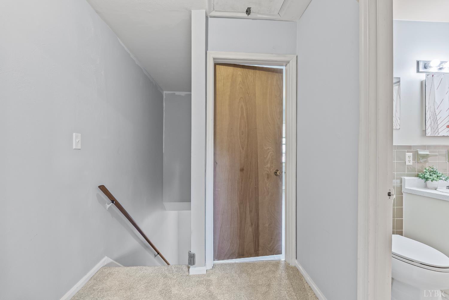 3101 Link Road, Unit 11 Lynchburg, VA 24503 - Photo 22 of 41 a view of a hallway with toilet