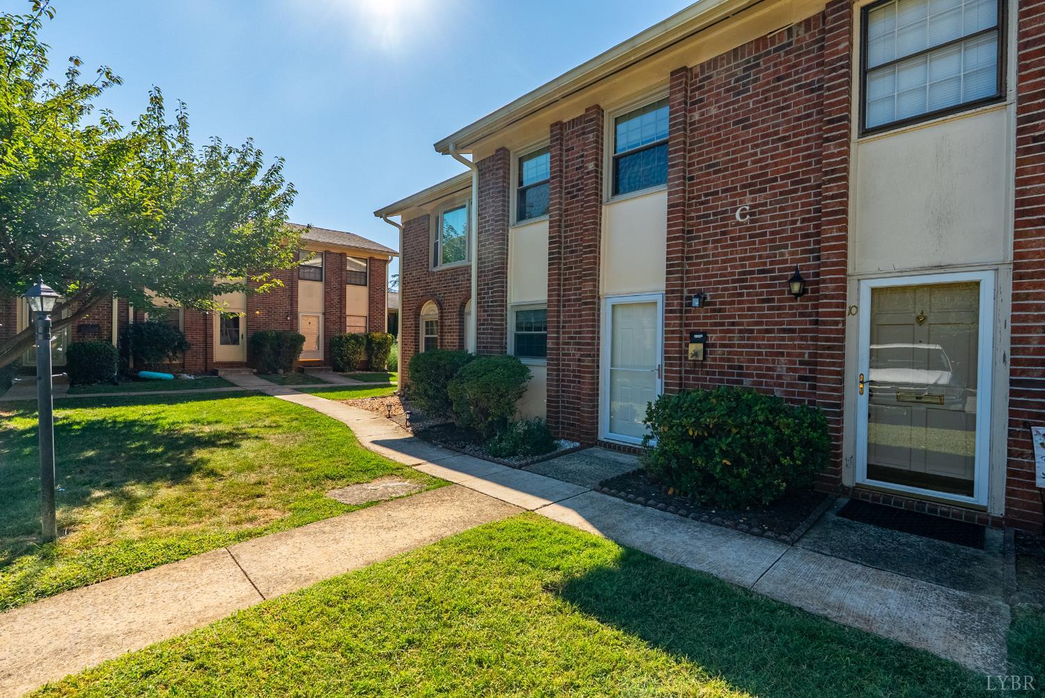 3101 Link Road, Unit 11 Lynchburg, VA 24503 - Photo 27 of 41 a view of a building with a yard