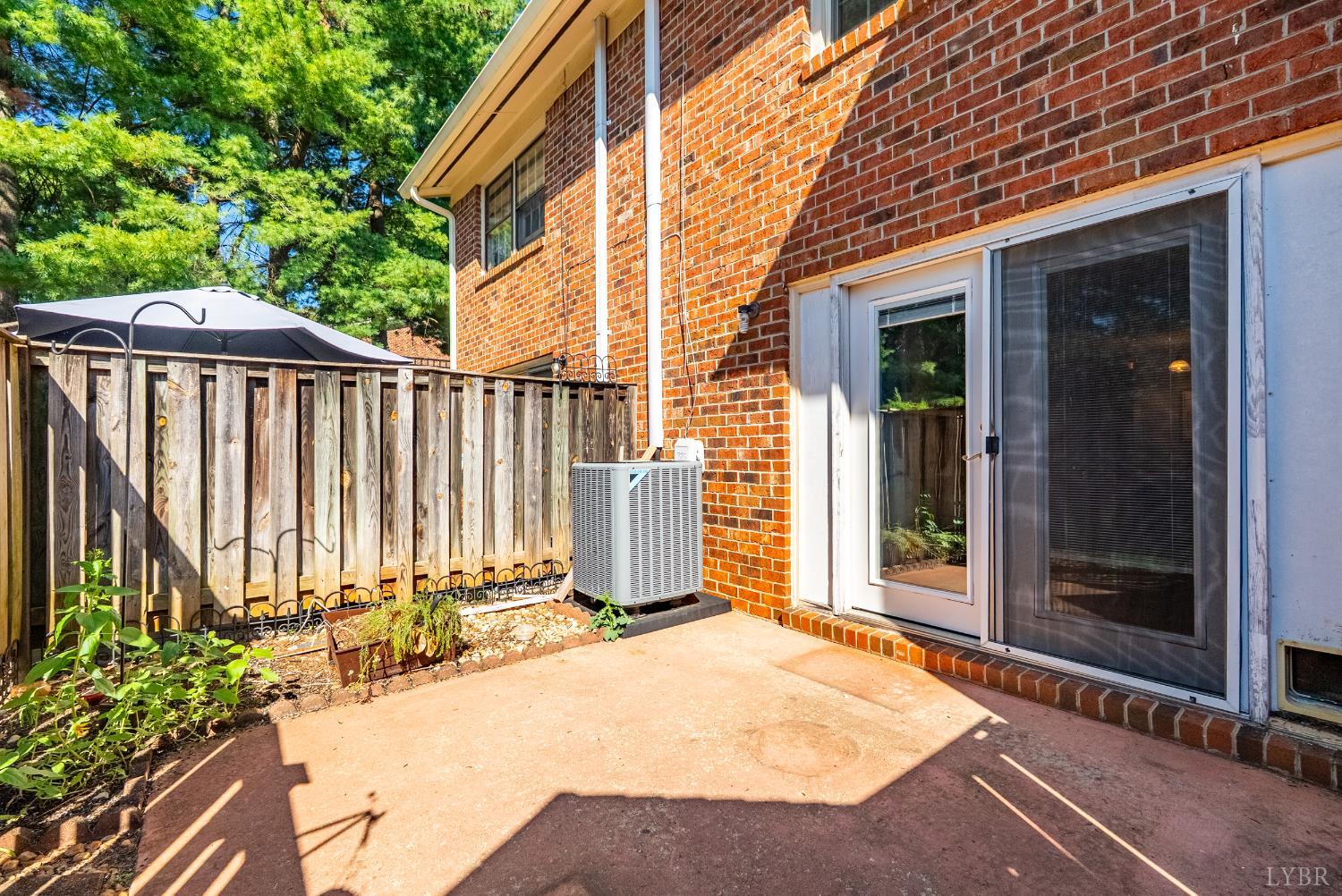 3101 Link Road, Unit 11 Lynchburg, VA 24503 - Photo 29 of 41 a view of backyard with tub and deck