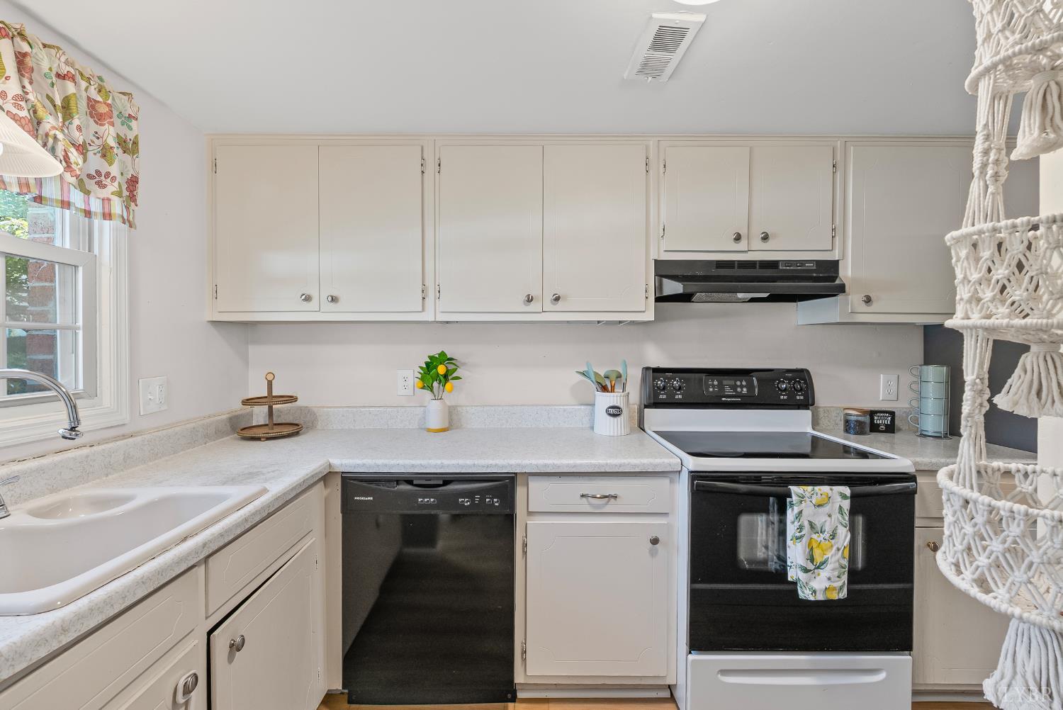 3101 Link Road, Unit 11 Lynchburg, VA 24503 - Photo 3 of 41 a kitchen with stainless steel appliances granite countertop a sink stove and cabinets