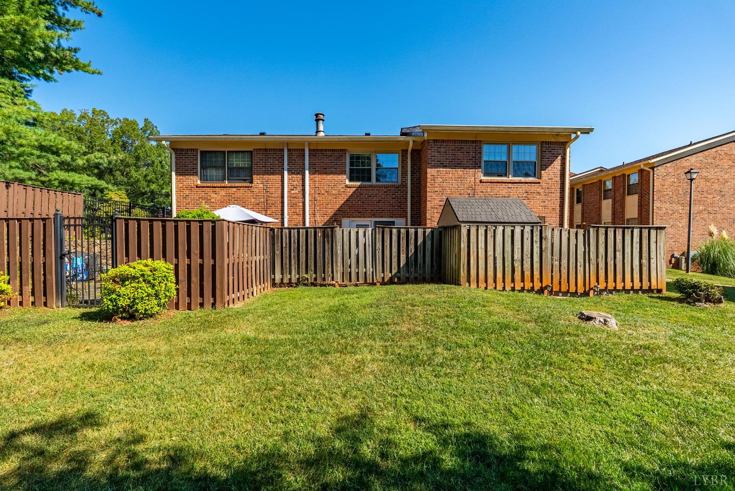 3101 Link Road, Unit 11 Lynchburg, VA 24503 - Photo 32 of 41 a view of a porch with a yard