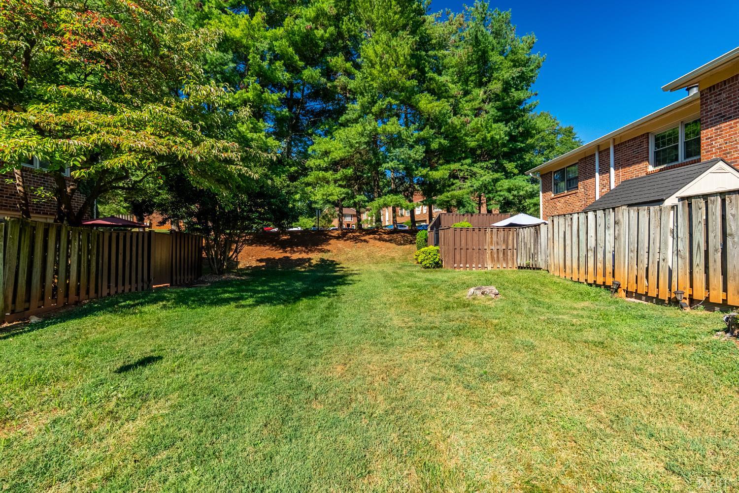 3101 Link Road, Unit 11 Lynchburg, VA 24503 - Photo 33 of 41 a view of a backyard with a garden