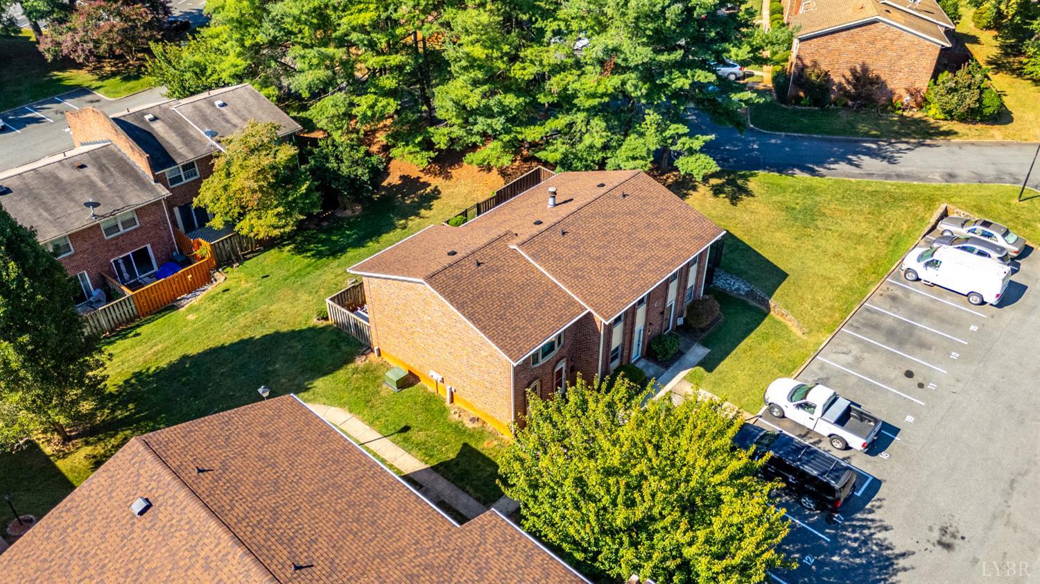 3101 Link Road, Unit 11 Lynchburg, VA 24503 - Photo 36 of 41 an aerial view of a house with a swimming pool a yard and a outdoor seating