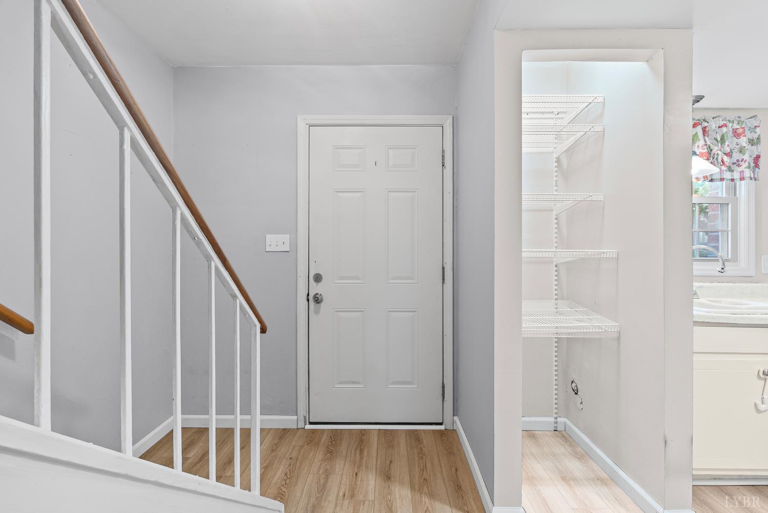 3101 Link Road, Unit 11 Lynchburg, VA 24503 - Photo 6 of 41 a view of entryway with wooden floor and stairs