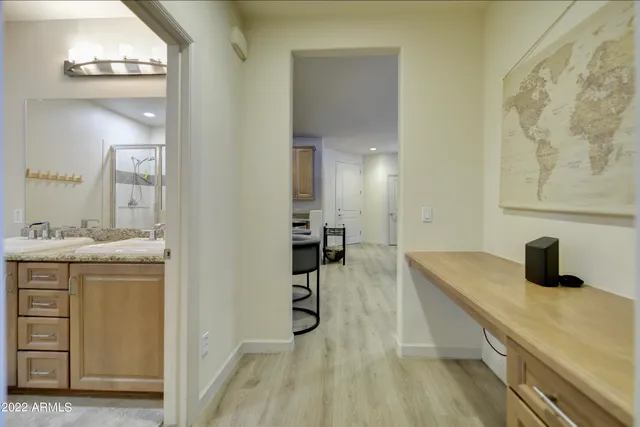 a bathroom with a sink and a shower