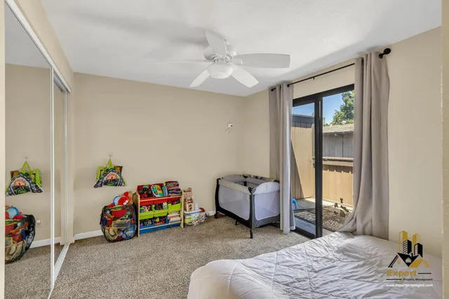 a bathroom with a sink double vanity and a toilet