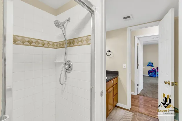 a bedroom with a bed and furniture