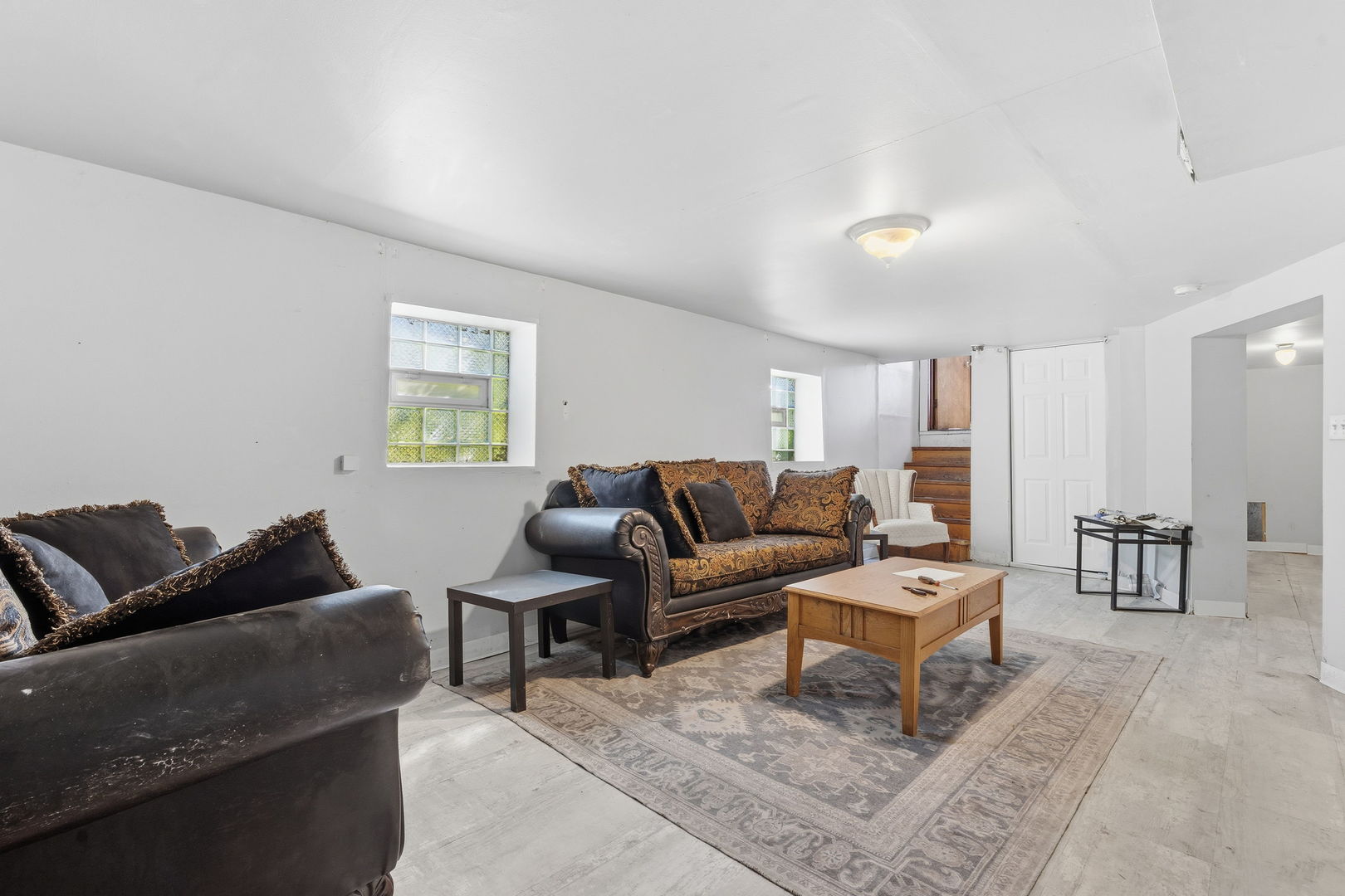 4016 West Crystal Street Chicago, IL 60651 - Photo 13 of 17 a living room with furniture and a couch