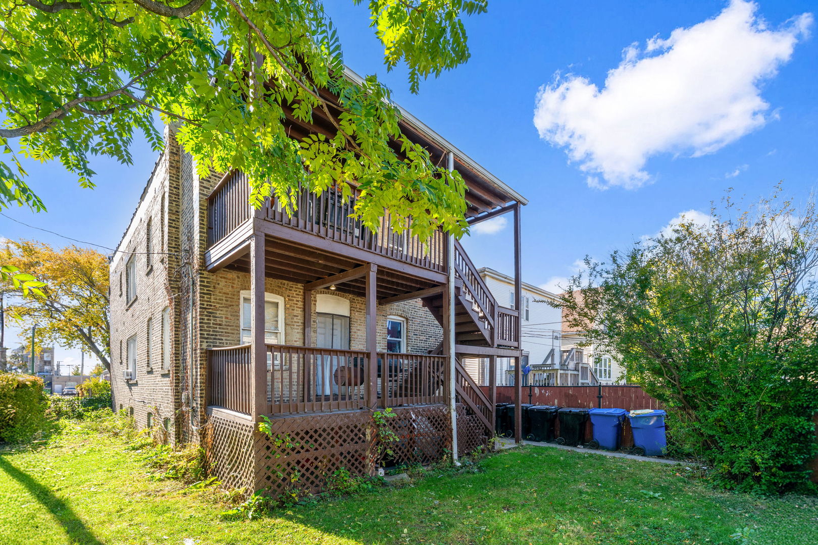 4016 West Crystal Street Chicago, IL 60651 - Photo 16 of 17 a view of front of house with a yard