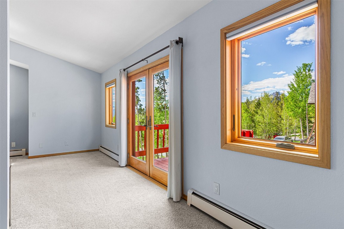 87 Spring Beauty Drive Silverthorne, CO 80498 - Photo 19 of 36 an empty room with windows