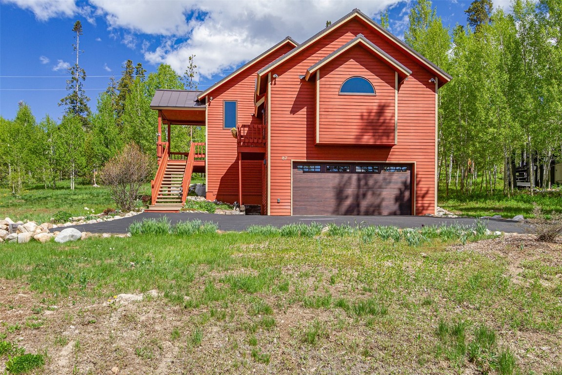 87 Spring Beauty Drive Silverthorne, CO 80498 - Photo 2 of 36 a front view of a house with a yard