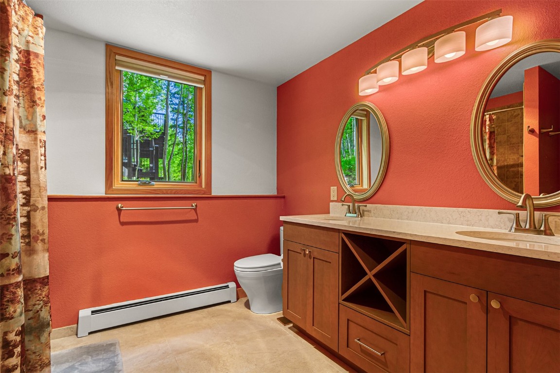 87 Spring Beauty Drive Silverthorne, CO 80498 - Photo 28 of 36 a room with a mirror and a window