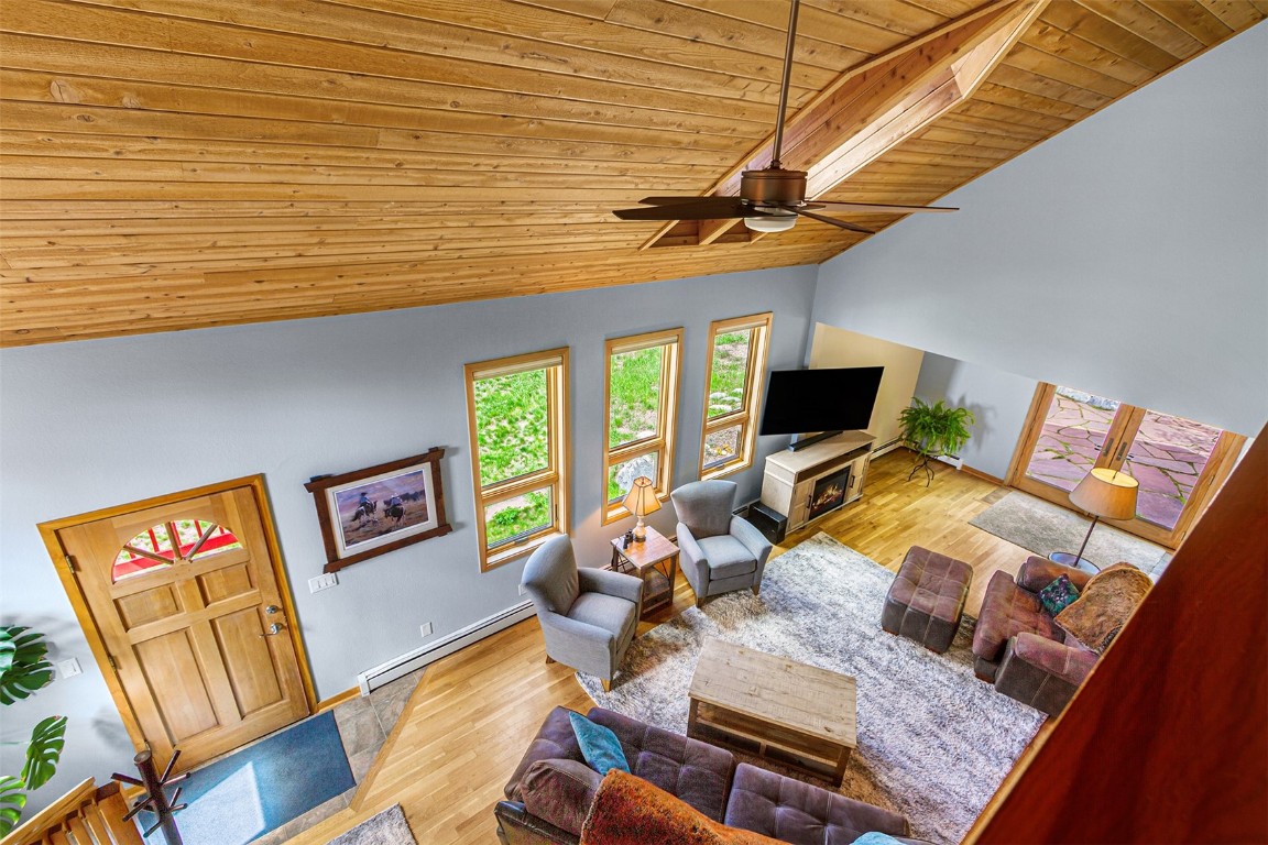 87 Spring Beauty Drive Silverthorne, CO 80498 - Photo 33 of 36 a living room with furniture and a flat screen tv