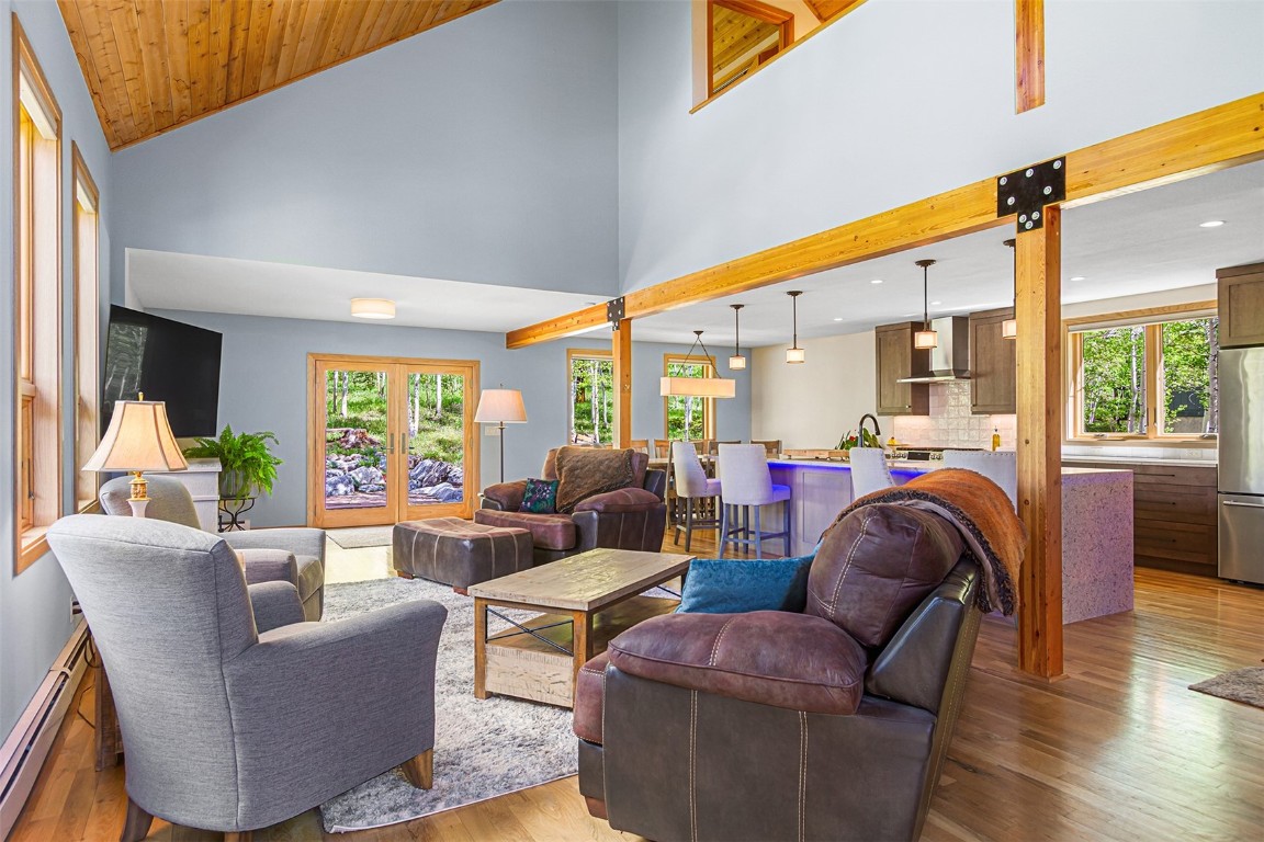 87 Spring Beauty Drive Silverthorne, CO 80498 - Photo 5 of 36 a living room with furniture and a large window