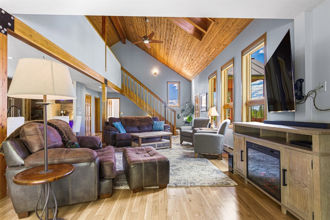 87 Spring Beauty Drive Silverthorne, CO 80498 - Photo 9 of 36 a living room with furniture and a fireplace