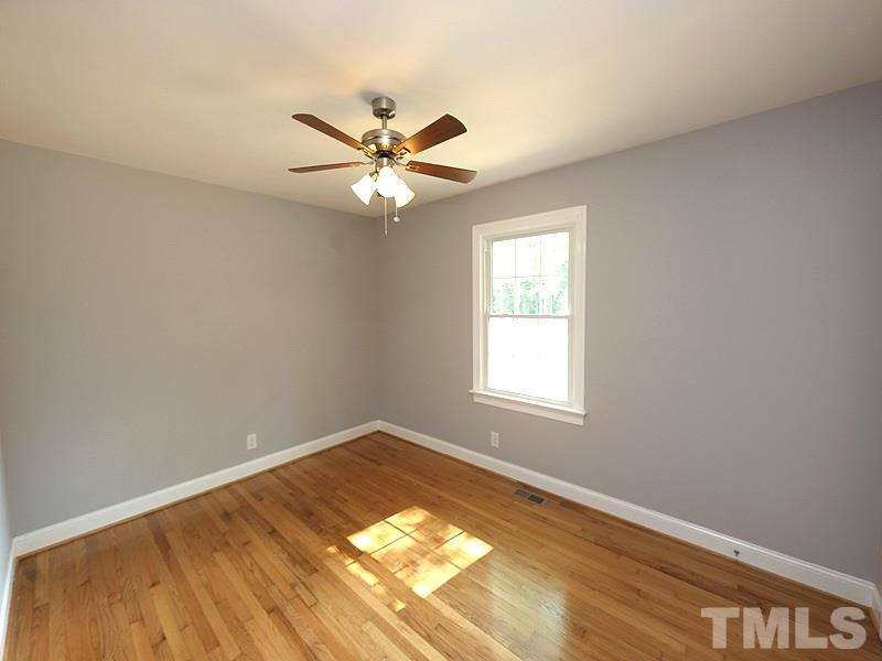 217 Chambers Road Rougemont, NC 27572 - Photo 12 of 19 an empty room with a window and ceiling fan