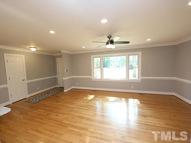 217 Chambers Road Rougemont, NC 27572 - Photo 18 of 19 a view of an empty room with wooden floor and a window