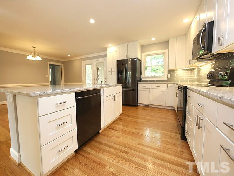 217 Chambers Road Rougemont, NC 27572 - Photo 4 of 19 a kitchen with a refrigerator and a sink