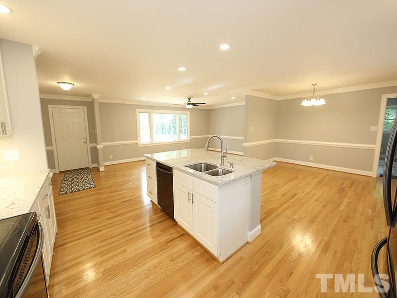 217 Chambers Road Rougemont, NC 27572 - Photo 19 of 19 a large white kitchen with wooden floor