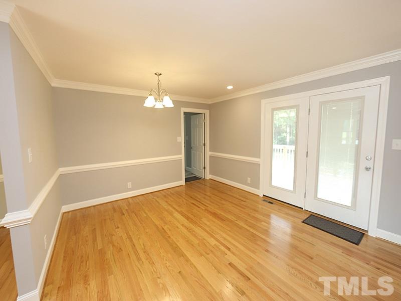 217 Chambers Road Rougemont, NC 27572 - Photo 6 of 19 a view of an empty room with wooden floor and a window