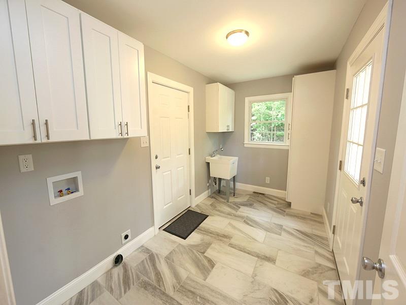 217 Chambers Road Rougemont, NC 27572 - Photo 7 of 19 a view of a bedroom with a bed and a window