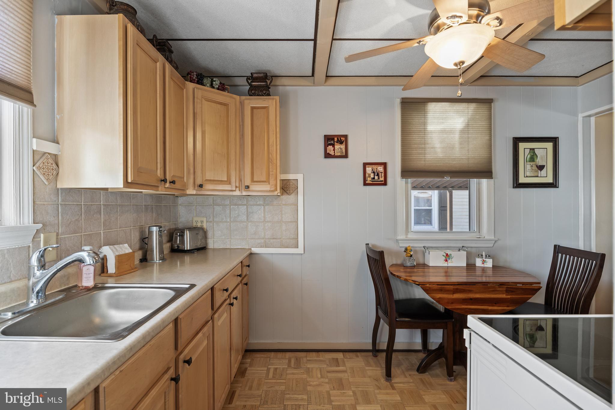 327 South Coles Avenue Maple Shade, NJ 08052 - Photo 11 of 22 a kitchen with a cabinets appliances and a sink