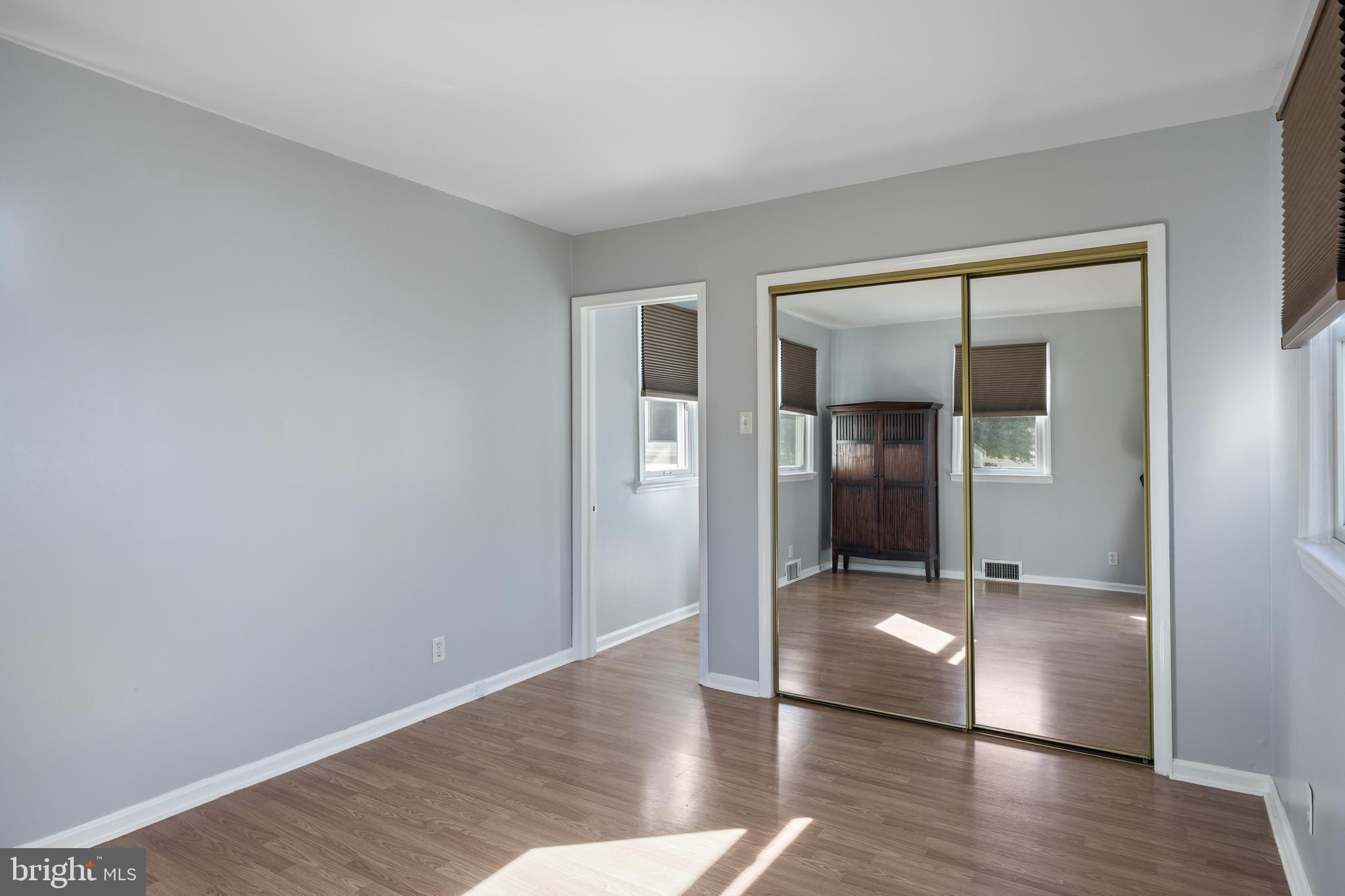 327 South Coles Avenue Maple Shade, NJ 08052 - Photo 18 of 22 wooden floor in a hall with an empty room