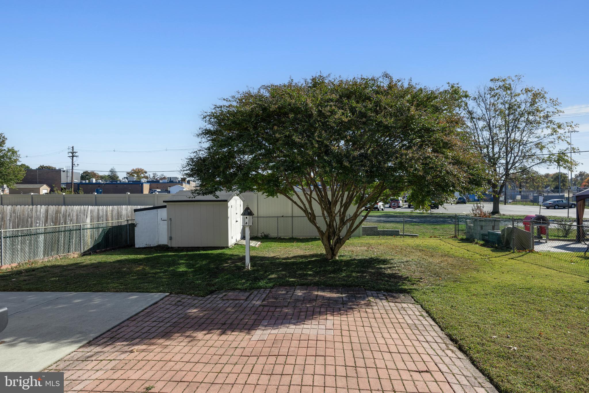 327 South Coles Avenue Maple Shade, NJ 08052 - Photo 3 of 22 a view of a backyard with plants and trees