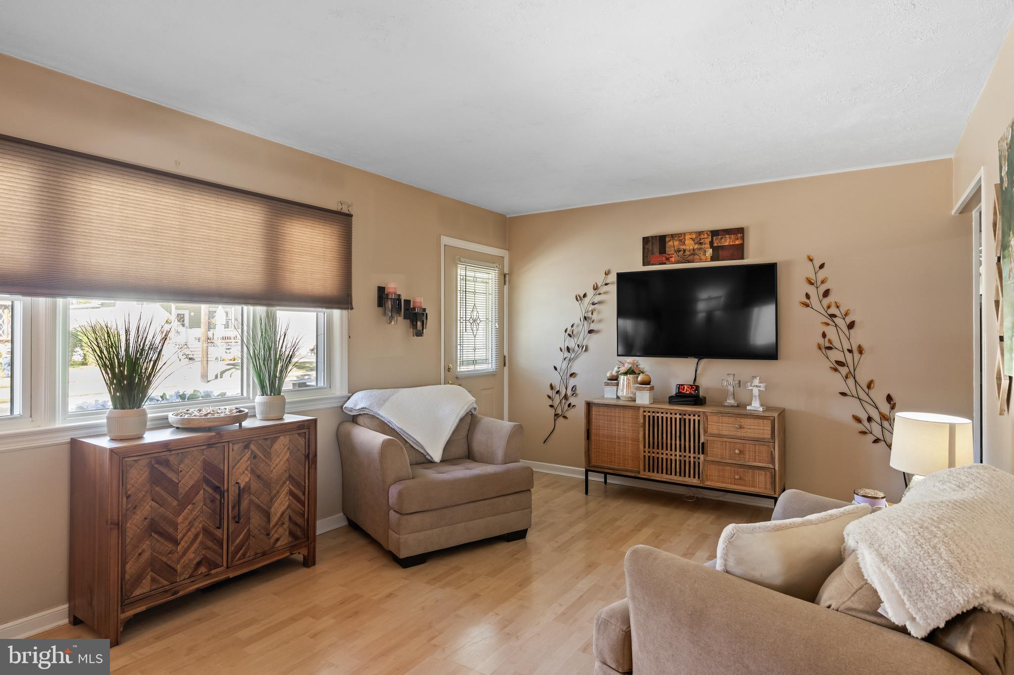 327 South Coles Avenue Maple Shade, NJ 08052 - Photo 8 of 22 a living room with furniture and a flat screen tv